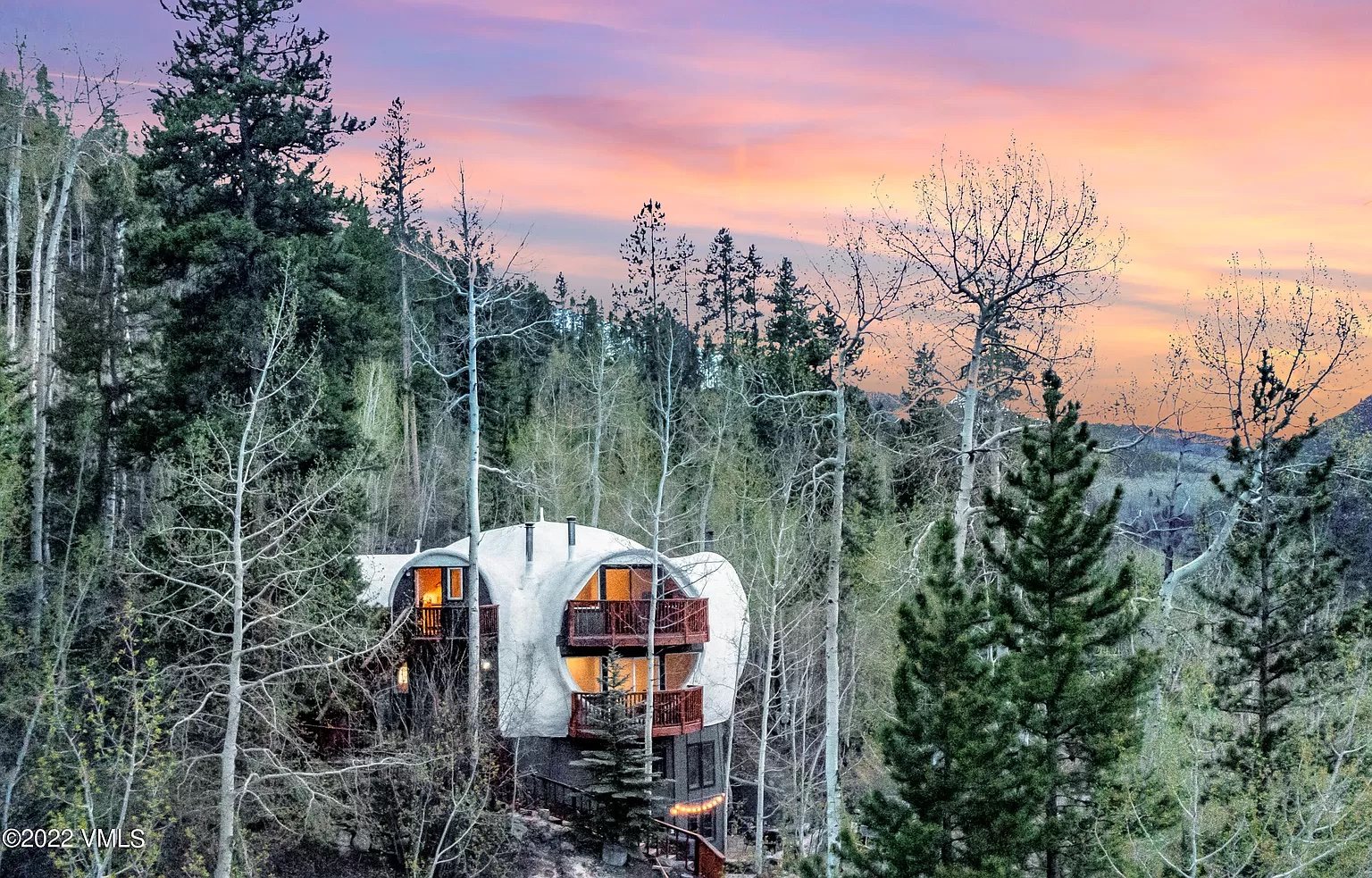 The Iconic Vail Dome at sunset among aspens